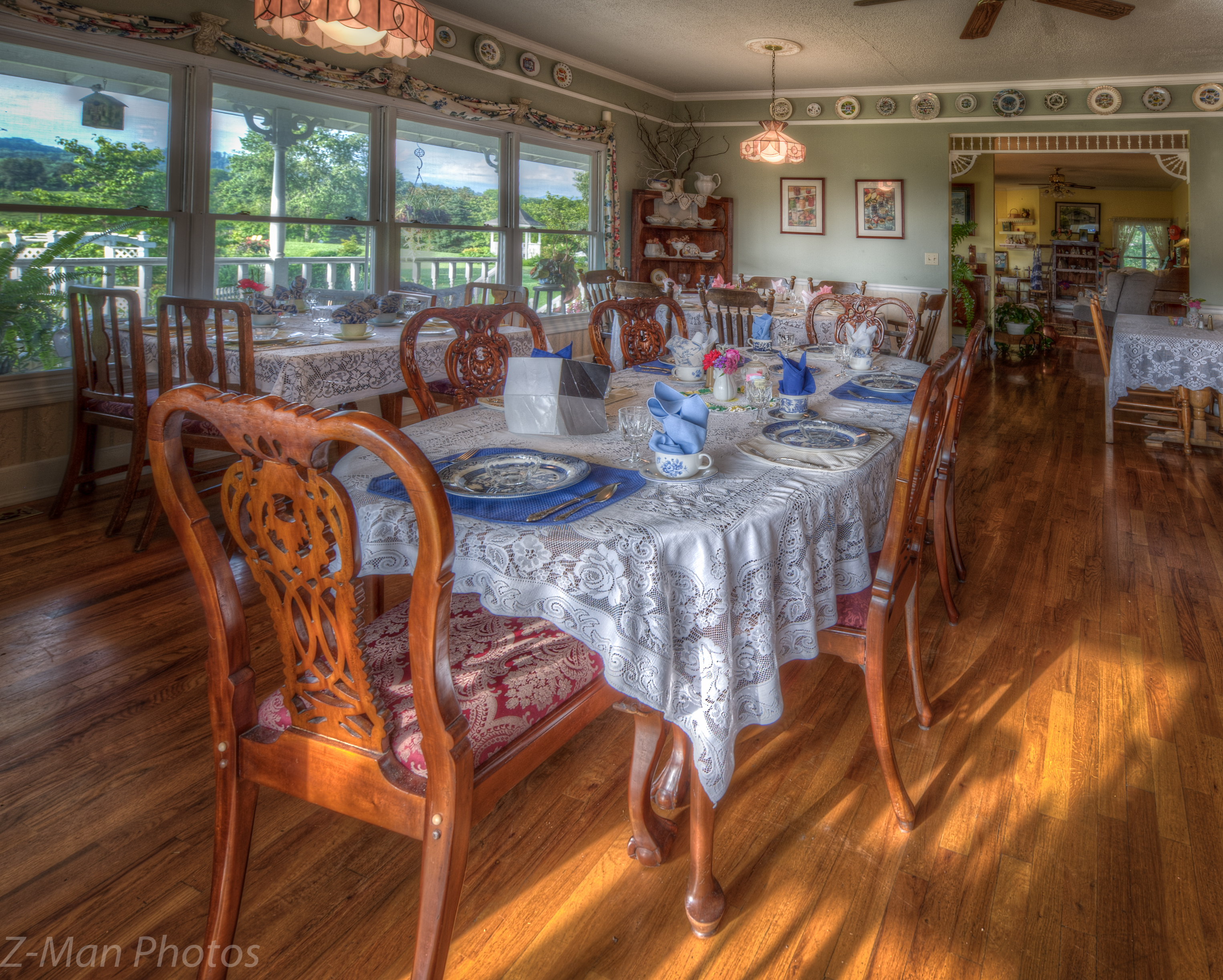 a dining room with a table set for a meal